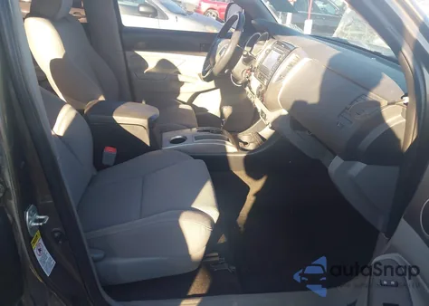 2013 Toyota Tacoma Base V6 z USA, uszkodzony, nr VIN 3TMLU4EN4DM123154